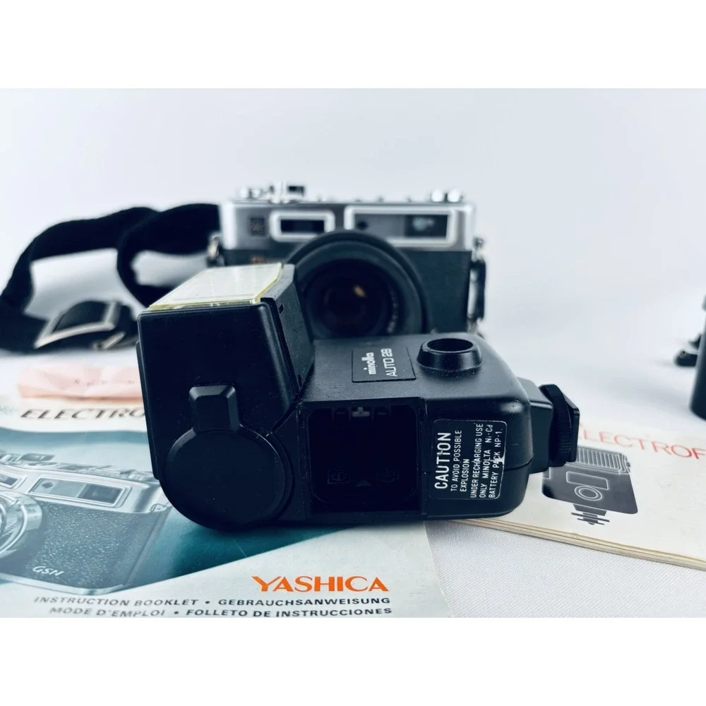 Yashica Vintage Electro 35 GSN Camera & Minolta Electroflash 28 & Film & Books